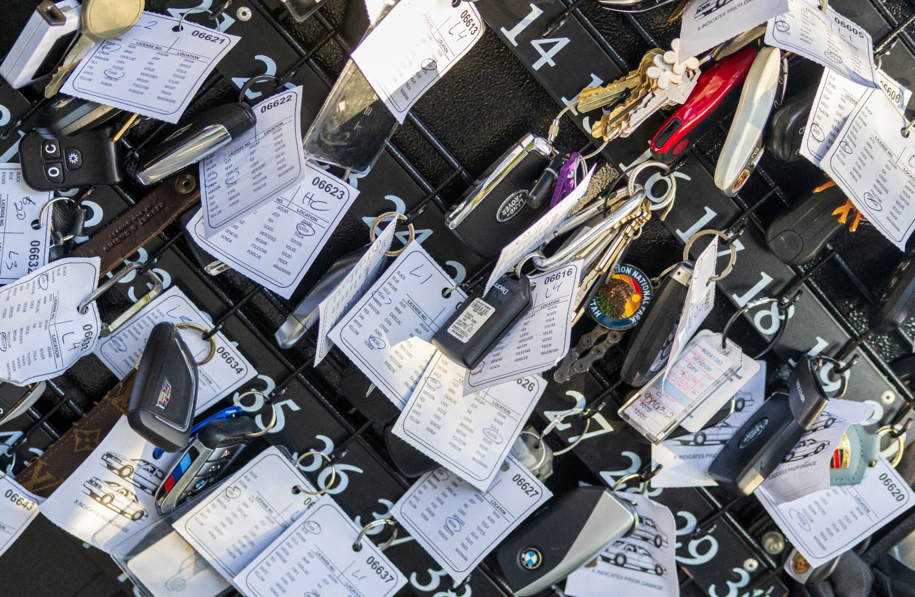 Valet key board organized with keys and numbered tickets